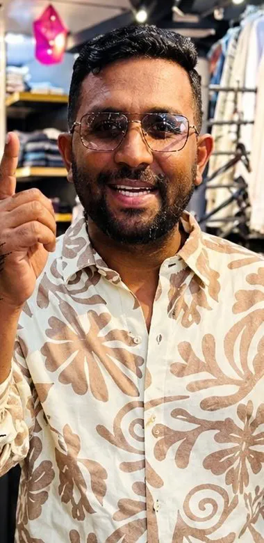Cream floral print shirt worn in the store
